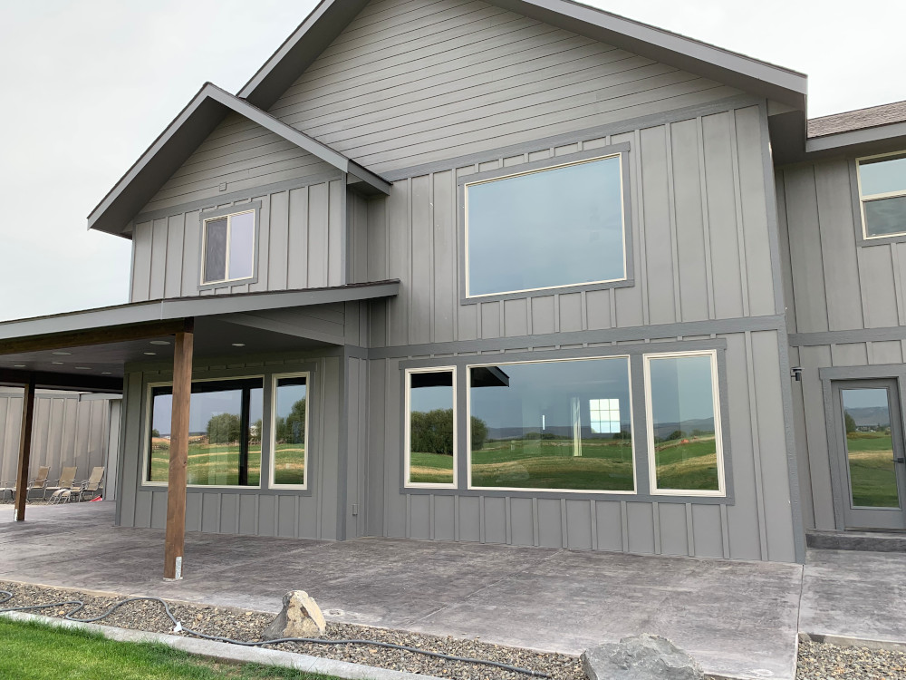 Gray house with large rectangle windows